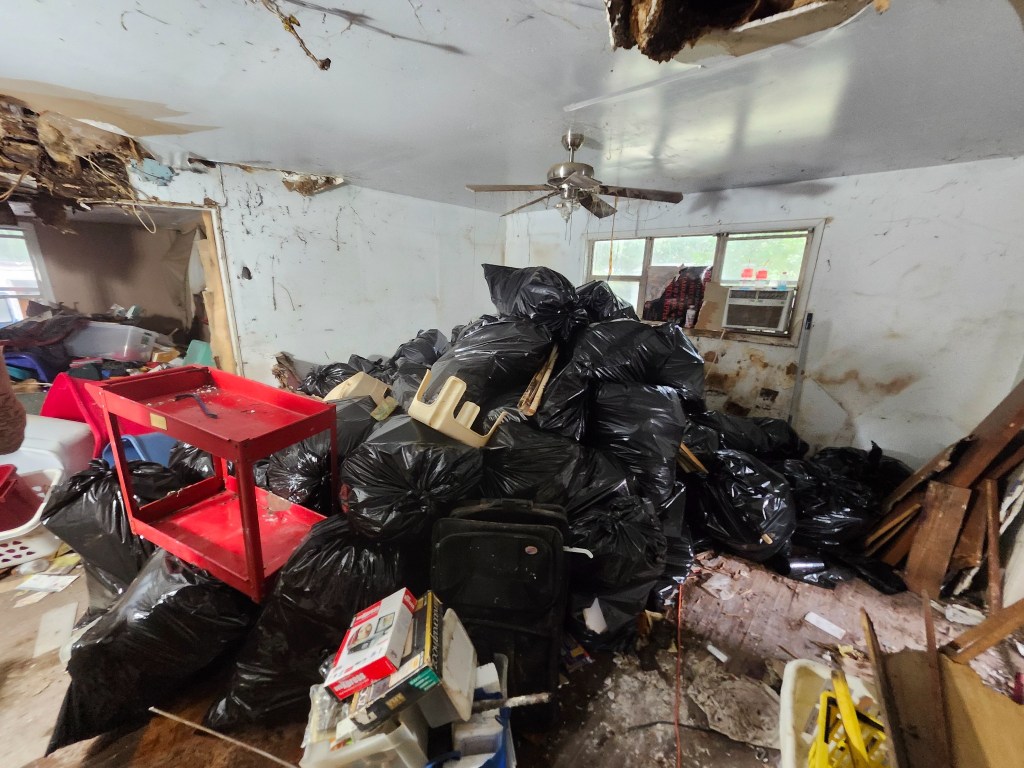 Investor property cleanout before unwanted contents were removed by Ocala Cleanout Specialists